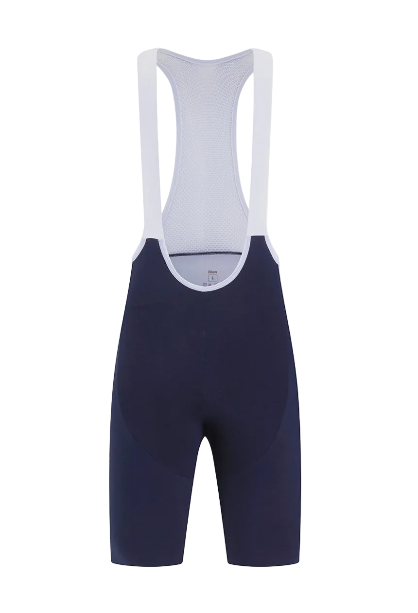 A pair of cycling bib shorts shown from the back, featuring a navy blue main body and white shoulder straps, set against a plain light gray background.