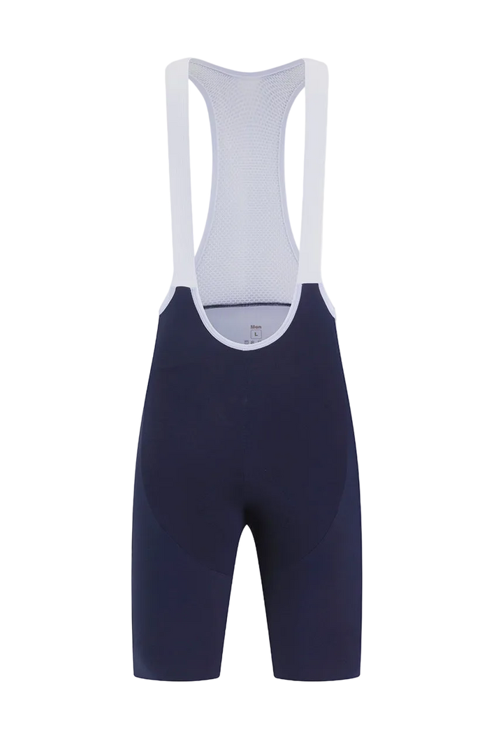 A pair of cycling bib shorts shown from the back, featuring a navy blue main body and white shoulder straps, set against a plain light gray background.